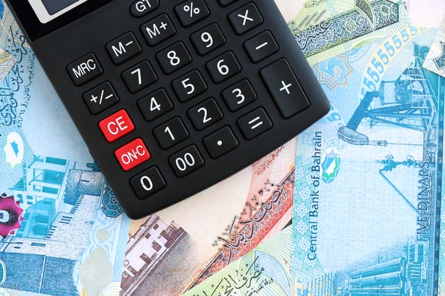 Bahraini Dinar Currency Money Bills And Calculator Close Up