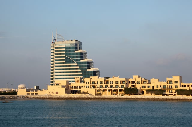 Modern Manama skyline with waterfront buildings